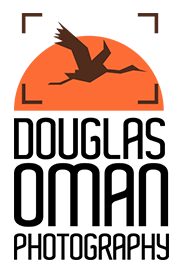 A logo of the company douglas oman.